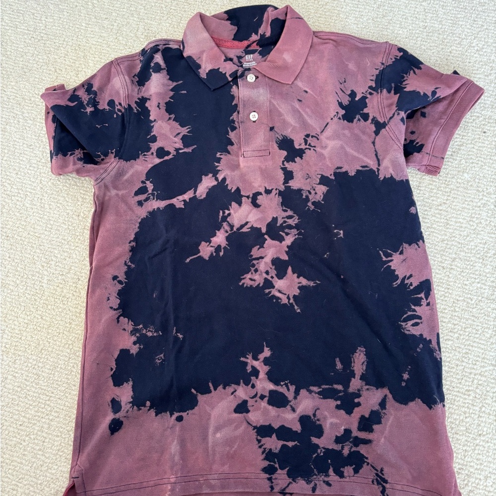 Tie-dyed polo shirts are youth XXL.